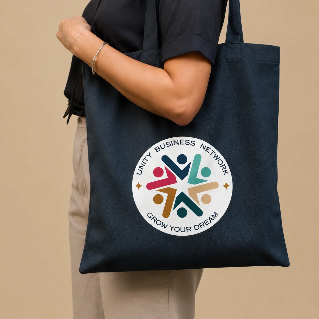 Unity branding on a navy canvas tote — concept imagery